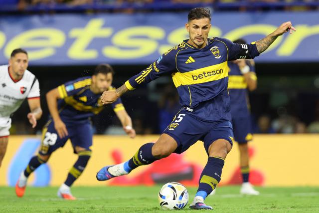 Boca Juniors' midfielder #05 Leandro Paredes scores his team's second goal during the Argentine Professional Football League 2026 Apertura Tournament match between Boca Juniors and Newell's Old Boys at La Bombonera stadium in Buenos Aires on February 1, 2026. (Photo by ALEJANDRO PAGNI / AFP)