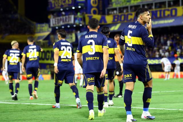 Boca Juniors' midfielder #05 Leandro Paredes (L) celebrates scoring his team's second goal during the Argentine Professional Football League 2026 Apertura Tournament match between Boca Juniors and Newell's Old Boys at La Bombonera stadium in Buenos Aires on February 1, 2026. (Photo by ALEJANDRO PAGNI / AFP)