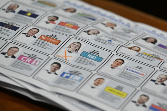 A ballot is pictured while election officials prepare to start counting votes after polls closed at the Pilar Jimenez school polling station during the presidential election in San Jose on February 1, 2026. Voters in Costa Rica, a beacon of stability in Central America threatened by a surge in drug-related violence, went to the polls in general elections that are expected to bring a tough-on-crime right-winger to power. (Photo by Marvin RECINOS / AFP)