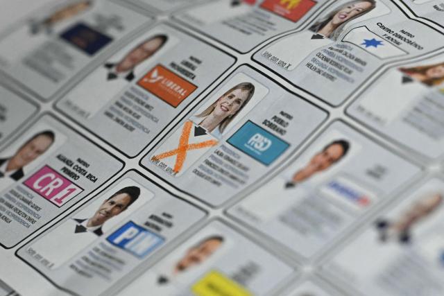 A ballot is pictured while election officials prepare to start counting votes after polls closed at the Pilar Jimenez school polling station during the presidential election in San Jose on February 1, 2026. Voters in Costa Rica, a beacon of stability in Central America threatened by a surge in drug-related violence, went to the polls in general elections that are expected to bring a tough-on-crime right-winger to power. (Photo by Marvin RECINOS / AFP)