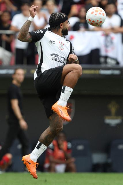 Corinthians' #10 Memphis Depay and controls the ball during the Supercopa do Brasil 2026 final football match between Flamengo and Corinthians at the Arena BRB Mane Garrincha stadium in Brasilia on February 1, 2026. (Photo by Sergio Lima / AFP)