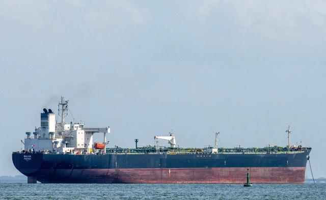 This view shows the crude oil tanker Blasa from Panama on Lake Maracaibo in Maracaibo, Venezuela on February 1, 2026. Venezuelan interim President Delcy Rodriguez of oil-rich Venezuela said on January 30, 2026, she had agreed on energy cooperation with India, a day after Caracas opened its hydrocarbons sector to private companies. (Photo by Maryorin Mendez / AFP)