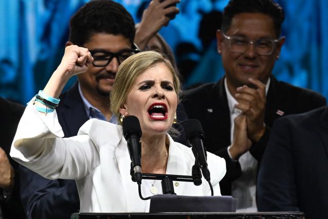 Costa Rica’s presidential candidate from the Sovereign People Party, Laura Fernandez, gestures as she delivers a speech after the presidential election results at the Aurola Hotel, in San Jose on February 1, 2026. Right-wing candidate Laura Fernandez won Costa Rica's presidential election on February 1 by a landslide after promising to crack down hard on rising violence linked to the cocaine trade. (Photo by MARVIN RECINOS / AFP)