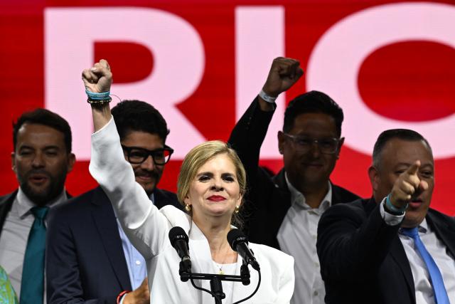 Costa Rica’s presidential candidate from the Sovereign People Party, Laura Fernandez, gestures to supporters during her victory speech after the presidential election results at the Aurola Hotel, in San Jose on February 1, 2026. Right-wing candidate Laura Fernandez won Costa Rica's presidential election on February 1 by a landslide after promising to crack down hard on rising violence linked to the cocaine trade. (Photo by MARVIN RECINOS / AFP)