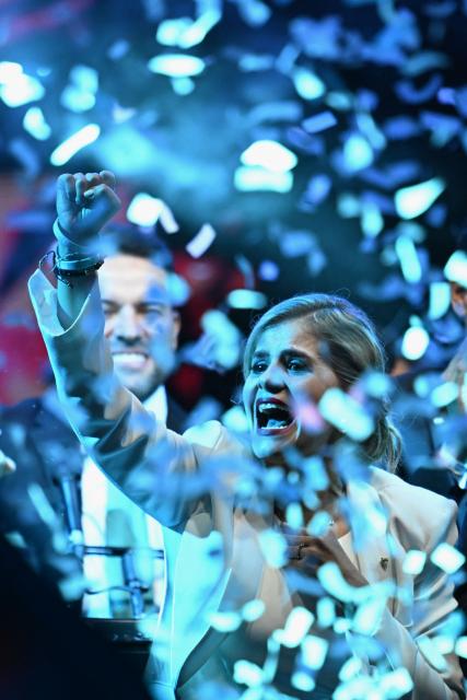 Costa Rica’s presidential candidate from the Sovereign People Party, Laura Fernandez, gestures to supporters during her victory speech after the presidential election results at the Aurola Hotel, in San Jose on February 1, 2026. Right-wing candidate Laura Fernandez won Costa Rica's presidential election on February 1 by a landslide after promising to crack down hard on rising violence linked to the cocaine trade. (Photo by MARVIN RECINOS / AFP)