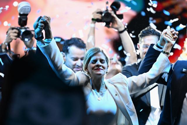 Costa Rica’s presidential candidate from the Sovereign People Party, Laura Fernandez, react during her victory speech after the presidential election results at the Aurola Hotel, in San Jose on February 1, 2026. Right-wing candidate Laura Fernandez won Costa Rica's presidential election on February 1 by a landslide after promising to crack down hard on rising violence linked to the cocaine trade. (Photo by MARVIN RECINOS / AFP)