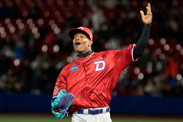 Dominican Republic's #40 Jefry Yan celebrates at the end of the eighth inning of the Caribbean Series baseball tournament second game between Dominican Republic's Leones del Escogido and Mexico's Charros de Jalisco at the Panamerican Stadium in Jalisco, Mexico, on February 1, 2026. (Photo by Ulises Ruiz / AFP)