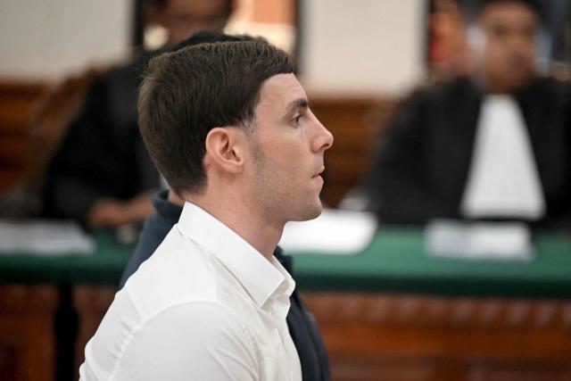 Australian suspect Darcy Francesco Jenson attends a hearing as part of his trial at a courtroom in Denpasar, Indonesia's Bali island, on February 2, 2026. The trial of three Australians accused of plotting the murder of a compatriot at a villa in Bali continues, with all facing the death penalty. (Photo by SONNY TUMBELAKA / AFP)