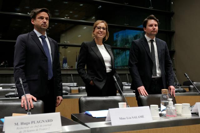 (LtoR) French journalists Hugo Plagnard, Lea Salame and Julien Duperray arrive for a hearing before the Commission d'Enquete sur l'Audiovisuel Public (Public broadcasting inquiry commission) at the National Assembly in Paris on February 2, 2026. (Photo by Thomas SAMSON / AFP)
