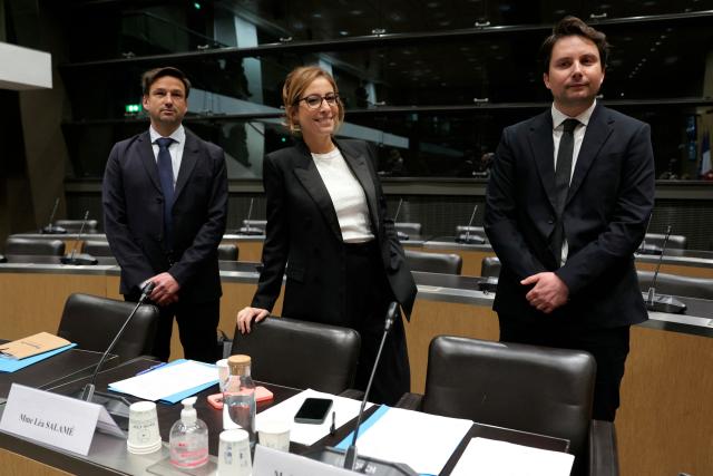 (LtoR) French journalists Hugo Plagnard, Lea Salame and Julien Duperray arrive for a hearing before the Commission d'Enquete sur l'Audiovisuel Public (Public broadcasting inquiry commission) at the National Assembly in Paris on February 2, 2026. (Photo by Thomas SAMSON / AFP)