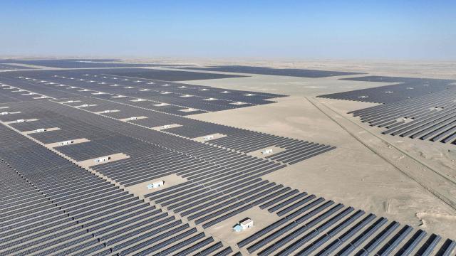 Rows of photovoltaic solar panels are seen at the Hongliuwa Photovoltaic Industrial Park in Jinta County in the Gobi Desert, in China's northwestern Gansu province on on February 1, 2026. (Photo by AFP) / China OUT