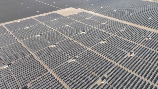Rows of photovoltaic solar panels are seen at the Hongliuwa Photovoltaic Industrial Park in Jinta County in the Gobi Desert, in China's northwestern Gansu province on on February 1, 2026. (Photo by AFP) / China OUT