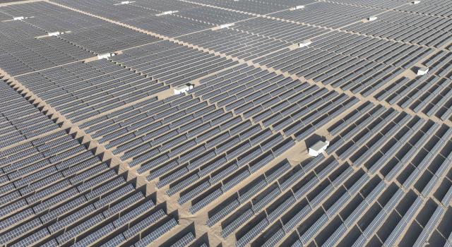 Rows of photovoltaic solar panels are seen at the Hongliuwa Photovoltaic Industrial Park in Jinta County in the Gobi Desert, in China's northwestern Gansu province on on February 1, 2026. (Photo by AFP) / China OUT