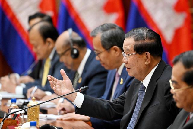 Cambodia's Senate President Hun Sen (2nd R) speaks to Pakistan's Senate Chairman Yusuf Raza Gilani during a meeting at their Senate building in Phnom Penh on February 2, 2026. (Photo by TANG CHHIN Sothy / AFP)