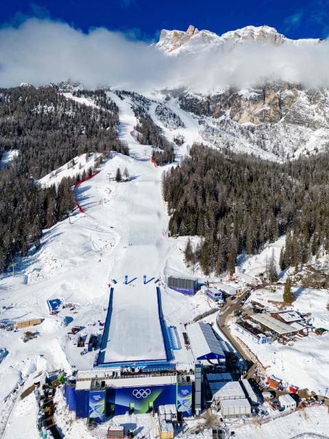 This aerial view shows the Tofane Alpine Skiing Centre hosting to the Olympic women's Alpine skiing events in Cortina d'Ampezzo, northern Italy prior to the Milano Cortina 2026 Olympic Games, on February 2, 2026. (Photo by Odd ANDERSEN / AFP)