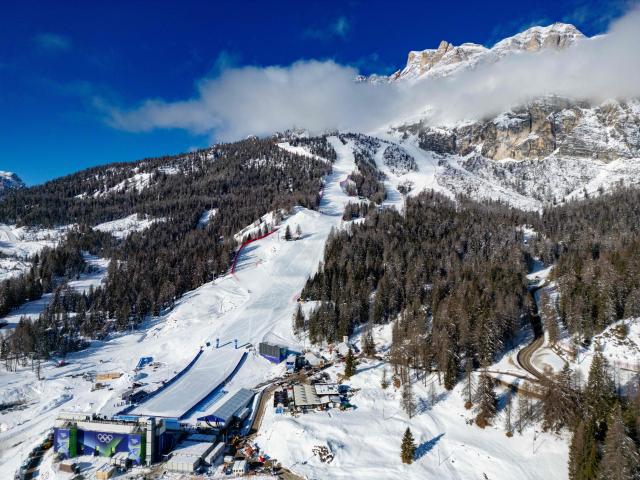 This aerial view shows the Tofane Alpine Skiing Centre hosting to the Olympic women's Alpine skiing events in Cortina d'Ampezzo, northern Italy prior to the Milano Cortina 2026 Olympic Games, on February 2, 2026. (Photo by Odd ANDERSEN / AFP)