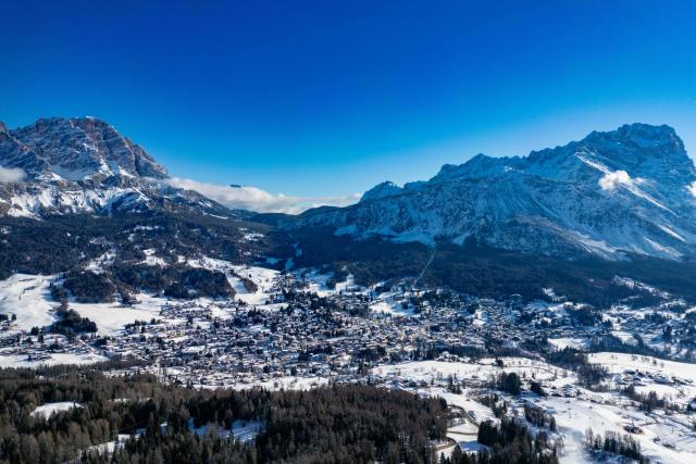 This aerial view shows Cortina d'Ampezzo, northern Italy prior to the Milano Cortina 2026 Olympic Games, on February 2, 2026. (Photo by Odd ANDERSEN / AFP)