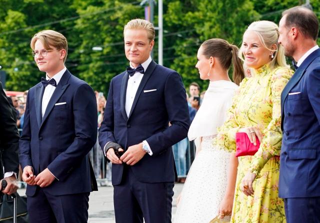(FILES) This file photo taken on June 16, 2022 shows Norway's Marius Borg Hoiby (2ndL) standing next to Norway's Crown Prince Haakon (R), Norway's Crown Princess Mette-Marit (2ndR), Norway's Princess Ingrid Alexandra (C) and Norway's Prince Sverre Magnus as they arrive for dinner at the government's celebration of Norway's Princess Ingrid Alexandra's 18th birthday at Deichman Bjoervika, Oslo's main library, months after her actual birthday. Norwegian police said on February 2, 2026 the son of Norway's future queen who will go on trial for rape this week, had been arrested suspected of assault, making threats and violating a restraining order. "The Oslo Police District can confirm that Marius Borg Hoiby was arrested by the police on Sunday evening (February 1), suspected of causing bodily harm, making threats with a knife, and violating a restraining order," the police said in a statement. It added that they had requested that Hoiby, who will go on trial on charges including four rapes on Tuesday, February 3, be remanded in custody for four weeks "on the grounds of risk of reoffending". (Photo by Lise Åserud / NTB / AFP) / Norway OUT