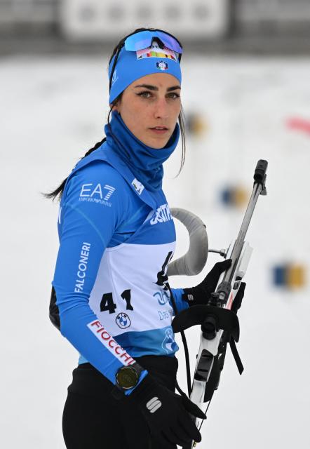 (FILES) Italy's Rebecca Passler reacts during the warm up shooting prior to the women's 7,5km sprint event of the IBU Biathlon World Championships in Oberhof, central Germany, on February 10, 2023. Italian biathlete Rebecca Passler has failed a doping test ahead of the Milan-Cortina Winter Olympics, the Italian anti-doping agency said on February 2, 2026. Passler, 24, has been "provisionally suspended" after her sample showed the presence of letrozole, a prohibited substance used to treat breast cancer, the agency (NADO Italia) said in a statement. (Photo by Christof STACHE / AFP)