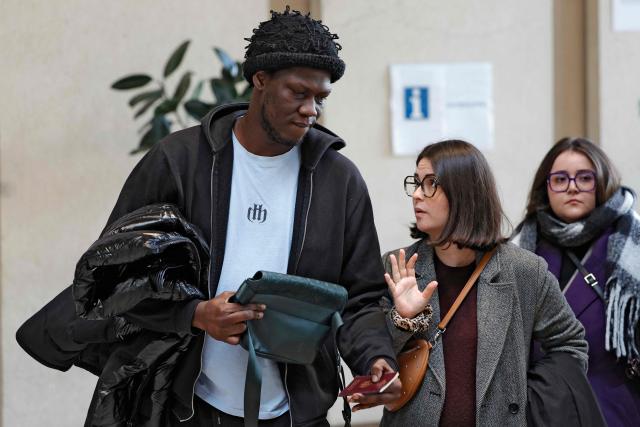 French rapper Doums, also known as Mamadou Coulibaly, arrives for his trial for violence against his partner at the Creteil courthouse, a suburb east of Paris, on February 2, 2026. (Photo by GEOFFROY VAN DER HASSELT / AFP)