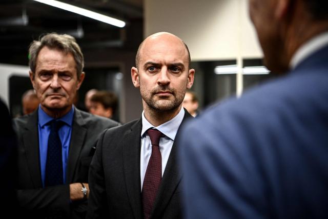 France's Minister for Europe and Foreign Affairs Jean-Noel Barrot listens to the staff during a visit to the Fonroche Lighting solar lighting company in Sainte-Colombe-en-Bruilhois, south-western France on February 2, 2026. (Photo by Christophe ARCHAMBAULT / AFP)
