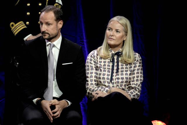 (FILES) Norway's Crown Prince Haakon and Crown Princess Mette-Marit attend the Save the Children peace prize party at the Nobel Peace Center ahead of the Nobel Peace Prize award ceremony at the Oslo City Hall in Oslo, Norway on December 10, 2024. Norwegian Crown Princess Mette-Marit's life was once the stuff of fairytales, but rape charges against her son and her recently revealed friendship with convicted US sex offender Jeffrey Epstein have seen it rapidly turn into a nightmare. The tale of the single mother from humble beginnings, whose chance encounter with Crown Prince Haakon propelled her to the heart of the monarchy, won the affection of Norwegians. But her frequent exchanges with Epstein, published this weekend in Norwegian media, have exposed an unsuspected relationship that has shocked the Scandinavian country. (Photo by Stian Lysberg Solum / NTB / AFP) / Norway OUT