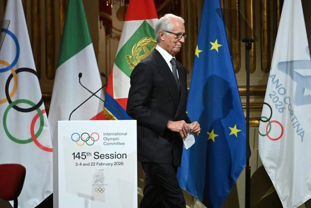 Italian president of Milano Cortina 2026 Foundation, Giovanni Malagò leaves the stage after his speech during the opening ceremony of the 145th IOC Session at La Scala Theatre in Milan on February 2, 2026. (Photo by PIERO CRUCIATTI / AFP)