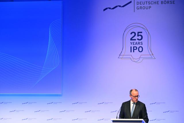 German Chancellor Friedrich Merz delivers a speech at the annual reception of the stock exchange operator Deutsche Boerse in Eschborn, western Germany, on February 2, 2026. (Photo by Kirill KUDRYAVTSEV / AFP)