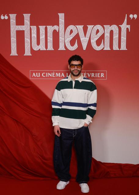 French actor Sami Outalbali poses during a photocall before the screening of the movie 'Wuthering Heights' at the Grand Rex theater in Paris on February 2, 2026. (Photo by GEOFFROY VAN DER HASSELT / AFP)