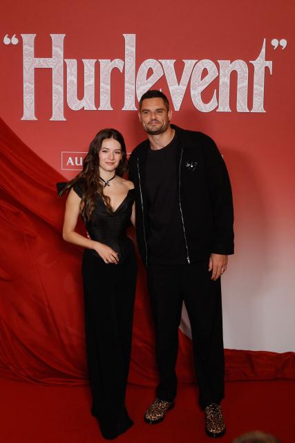 France's swimmer Florent Manaudou and French dancer and actress Elsa Bois pose during a photocall before the screening of the movie 'Wuthering Heights' at the Grand Rex theater in Paris on February 2, 2026. (Photo by GEOFFROY VAN DER HASSELT / AFP)