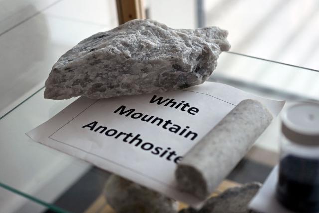 A piece of White Mountain anorthosite minreal is seen at the Greenland School of Minerals and Petroleum in Sisimiut, Greenland on February 2, 2026. The purpose and ambition of Greenland School of Minerals and Petroleum (GSMP) is to ensure a skilled workforce for the Greenlandic mining and construction industries. The school offers students international courses during four years apprenticeship programs "skilled manual miner" and "skilled operator of construction equipment". (Photo by Ina FASSBENDER / AFP)
