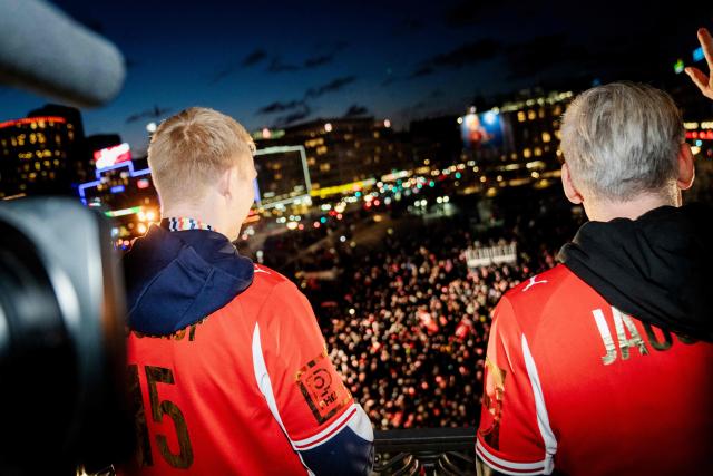 Denmark's men's handball team Magnus Saugstrup and National Coach Nikolaj Jacobsen (R) celebrate as European champions on the balcony at the Copenhagen City Hall in Copenhagen, Denmark on February 2, 2026, after the team won gold at the Men's EHF Euro 2026 final handball match Denmark vs Germany. (Photo by Sebastian Elias Uth / Ritzau Scanpix / AFP) / Denmark OUT