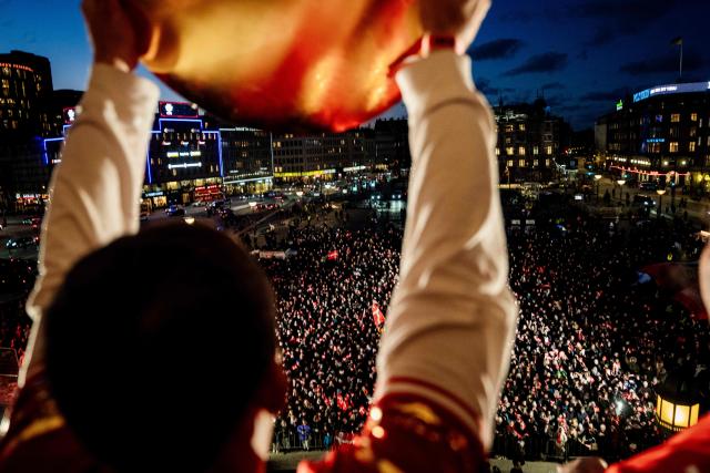 Denmark's men's handball team Thomas Arnoldsen celebrate as European champions on the balcony at the Copenhagen City Hall in Copenhagen, Denmark on February 2, 2026, after the team won gold at the Men's EHF Euro 2026 final handball match Denmark vs Germany. (Photo by Sebastian Elias Uth / Ritzau Scanpix / AFP) / Denmark OUT