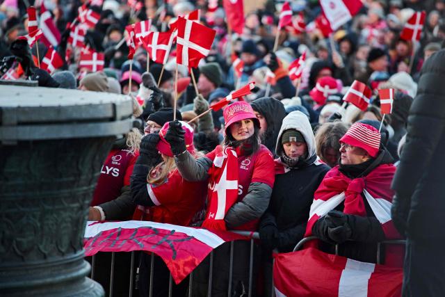People gather at the City Hall Square to celebrate Denmark's men's handball national team in Copenhagen, Denmark on February 2, 2026, after the team won gold at the Men's EHF Euro 2026 final handball match. (Photo by Thomas Traasdahl / Ritzau Scanpix / AFP) / Denmark OUT