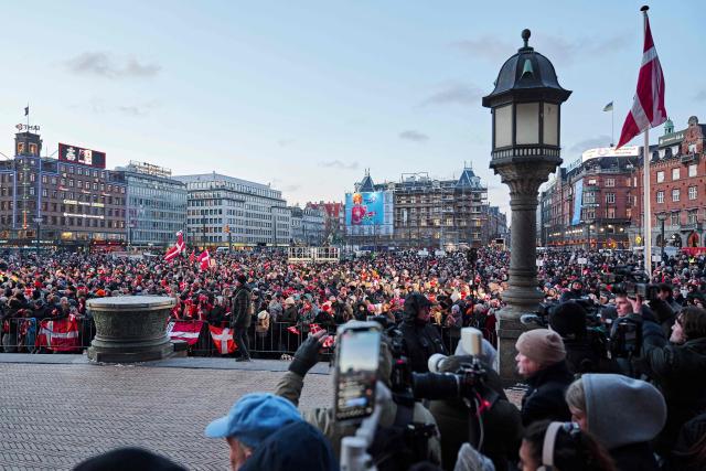 People gather at the City Hall Square to celebrate Denmark's men's handball national team in Copenhagen, Denmark on February 2, 2026, after the team won gold at the Men's EHF Euro 2026 final handball match. (Photo by Thomas Traasdahl / Ritzau Scanpix / AFP) / Denmark OUT