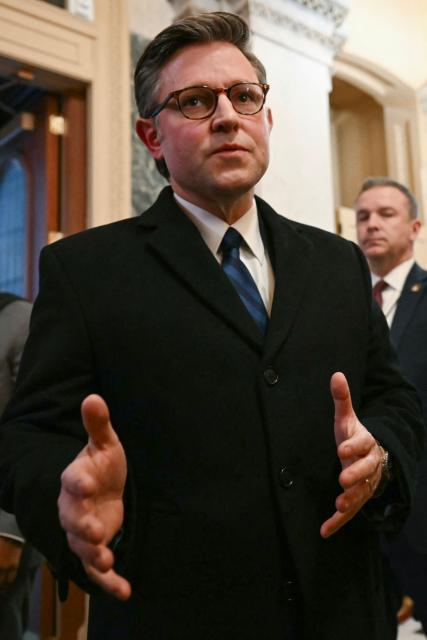 US Speaker of the House Mike Johnson, Republican from Louisiana, speaks with reporters as he arrives at the US Capitol in Washington DC, on February 2, 2026. US House Speaker Mike Johnson expressed confidence on February 1 that he has the votes to end by Tuesday a partial government shutdown triggered by the Trump administration's violent immigration sweeps in Minneapolis. The government entered the shutdown Saturday as a funding deadline passed without Congress approving a 2026 budget. The impact so far appears to have been minimal. (Photo by ANDREW CABALLERO-REYNOLDS / AFP)