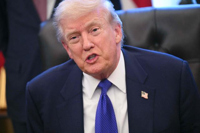US President Donald Trump speaks to the press in the Oval Office of the White House in Washington, DC, on February 2, 2026. (Photo by SAUL LOEB / AFP)