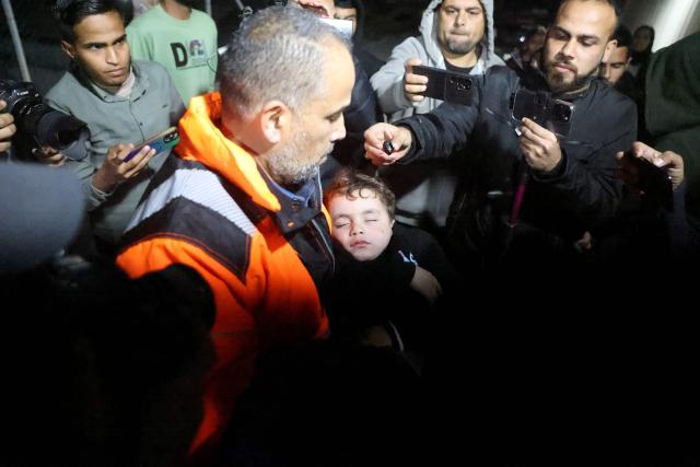 Palestinians coming from the Rafah crossing from Egypt arrive at Nasser Hospital in Khan Yunis in the southern Gaza Strip on February 2, 2026. Sick and wounded Gazans began crossing into Egypt to seek medical treatment after Israel permitted a limited reopening of the Palestinian territory's Rafah border post. Around 150 people were due to leave the territory, and 50 to enter it, according to Egyptian officials, more than 20 months after Israeli forces fighting in Gaza closed the crossing. (Photo by Bashar Taleb / AFP)