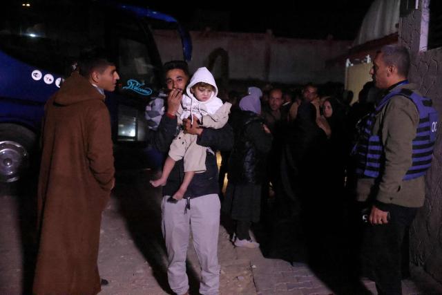 Palestinians coming from the Rafah crossing from Egypt arrive at Nasser Hospital in Khan Yunis in the southern Gaza Strip on February 2, 2026. Sick and wounded Gazans began crossing into Egypt to seek medical treatment after Israel permitted a limited reopening of the Palestinian territory's Rafah border post. Around 150 people were due to leave the territory, and 50 to enter it, according to Egyptian officials, more than 20 months after Israeli forces fighting in Gaza closed the crossing. (Photo by Bashar Taleb / AFP)