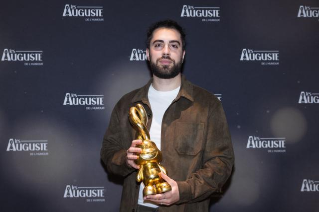 French comedian Hugo Pecheur poses during the second edition of the Auguste de l'Humour awards ceremony for stand-up comedy and humorous performances at the "Nouveau Siecle" venue in Lille, northern France, on February 2, 2026. Elodie Poux was crowned comedian of the year at the second edition of the Auguste de l'humour awards in Lille on February 2, 2026, during a ceremony that sought to honour women after criticism of the overrepresentation of men among the nominees. (Photo by Sameer Al-DOUMY / AFP)