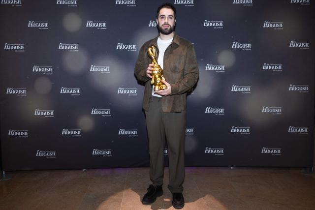 French comedian Hugo Pecheur poses during the second edition of the Auguste de l'Humour awards ceremony for stand-up comedy and humorous performances at the "Nouveau Siecle" venue in Lille, northern France, on February 2, 2026. Elodie Poux was crowned comedian of the year at the second edition of the Auguste de l'humour awards in Lille on February 2, 2026, during a ceremony that sought to honour women after criticism of the overrepresentation of men among the nominees. (Photo by Sameer Al-DOUMY / AFP)