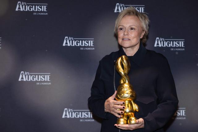 French actress and Honorary Award Recipient, Muriel Robin, poses during the second edition of the Auguste de l'Humour awards ceremony for stand-up comedy and humorous performances at the "Nouveau Siecle" venue in Lille, northern France, on February 2, 2026. Elodie Poux was crowned comedian of the year at the second edition of the Auguste de l'humour awards in Lille on February 2, 2026, during a ceremony that sought to honour women after criticism of the overrepresentation of men among the nominees. (Photo by Sameer Al-DOUMY / AFP)