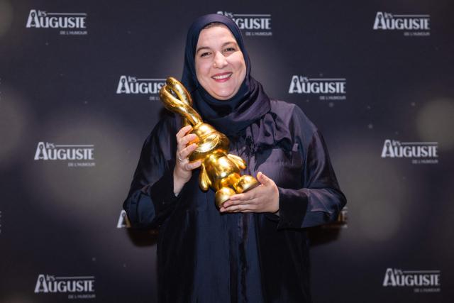 Algerian comedian Ines poses during the second edition of the Auguste de l'Humour awards ceremony for stand-up comedy and humorous performances at the "Nouveau Siecle" venue in Lille, northern France, on February 2, 2026. Elodie Poux was crowned comedian of the year at the second edition of the Auguste de l'humour awards in Lille on February 2, 2026, during a ceremony that sought to honour women after criticism of the overrepresentation of men among the nominees. (Photo by Sameer Al-DOUMY / AFP)