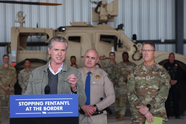 California Governor Gavin Newsom speaks alongside California Highway Patrol (CHP) Commissioner Sean Duryee and Major General Matthew Beevers, The Adjutant General of California, about California National Guard and CHP seizures of illicit drugs including fentanyl and border security operations during a press conference at Montgomery-Gibbs Executive Airport in San Diego, California on February 2, 2026. (Photo by Patrick T. Fallon / AFP)