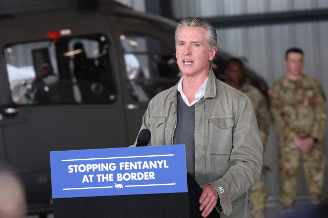 California Governor Gavin Newsom speaks about the California National Guard and California Highway Patrol (CHP) seizures of illicit drugs including fentanyl and border security operations during a press conference at Montgomery-Gibbs Executive Airport in San Diego, California on February 2, 2026. (Photo by Patrick T. Fallon / AFP)