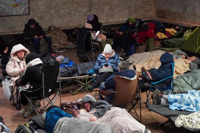 People take shelter at a metro station during a Russian air attack, in Kyiv, on early February 3, 2026, amid the Russian invasion of Ukraine. (Photo by Serhii Okunev / AFP)