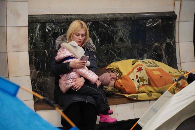 People take shelter at a metro station during a Russian air attack, in Kyiv, early on February 3, 2026, amid the Russian invasion of Ukraine. (Photo by Serhii Okunev / AFP)