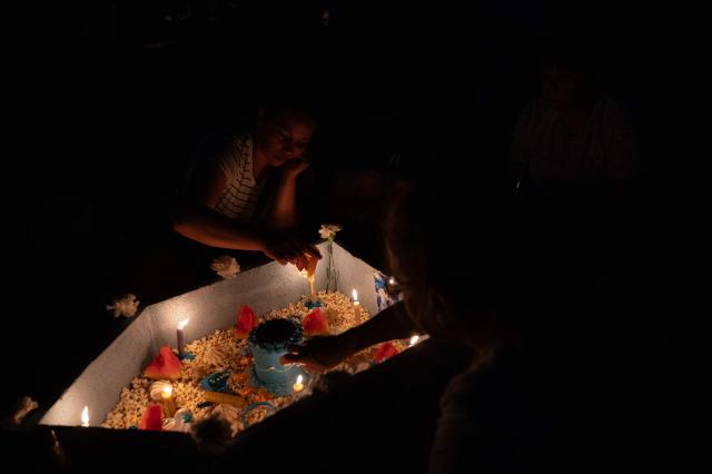 Believers offer tribute to Iemanja, the Goddess of the Sea of the Afro-American religion Umbanda, at Ramirez Beach in Montevideo on February 2, 2026. (Photo by Eitan ABRAMOVICH / AFP)