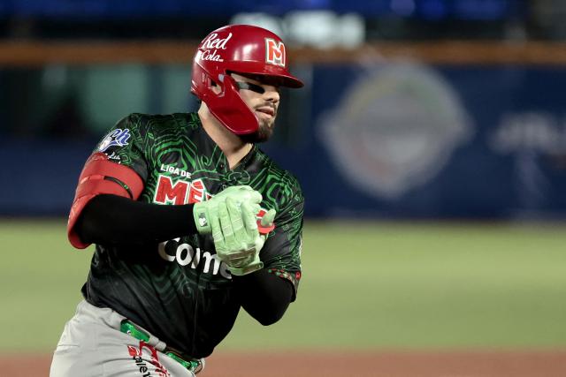 Charros de Jalisco's #31 Julian Ornelas celebrates scoring a run in the second inning of the Caribbean Series baseball tournament fourth game between Mexico's Charros de Jalisco and Panama's Federales de Chiriqui at the Panamerican Stadium in Jalisco, Mexico, on February 2, 2026. (Photo by Ulises Ruiz / AFP)