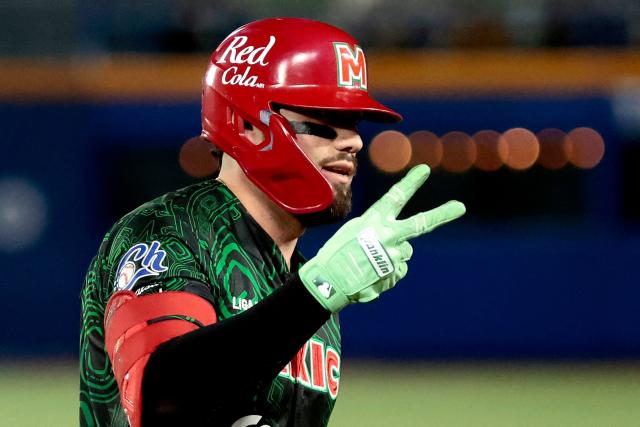 Charros de Jalisco's #31 Julian Ornelas celebrates scoring a run in the second inning of the Caribbean Series baseball tournament fourth game between Mexico's Charros de Jalisco and Panama's Federales de Chiriqui at the Panamerican Stadium in Jalisco, Mexico, on February 2, 2026. (Photo by Ulises Ruiz / AFP)
